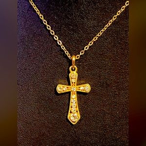 Gold tone rhinestone filigree cross necklace